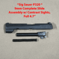 Sig Sauer P320 9mm complete slide assembly with barrel and recoil spring for enhanced performance.
