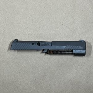 Sig Sauer P320 9mm slide assembly with barrel, designed for performance and reliability.