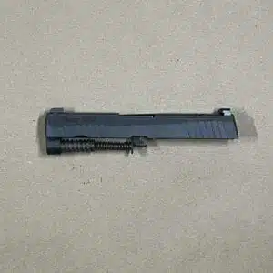 Sig Sauer P320 9mm slide assembly with night sights, optic-ready for compact firearms.