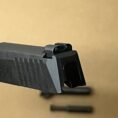 Sig Sauer P365 9mm slide assembly with barrel and night sights for enhanced performance.