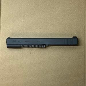 Glock 17 L Complete Long Slide Barrel Gen 3 4 Oem 9 Mm Kit 17 22 31 34 Tcm Stock 8 Glock 17 L complete long slide barrel, Gen 3 OEM 9mm pistol component on cardboard.