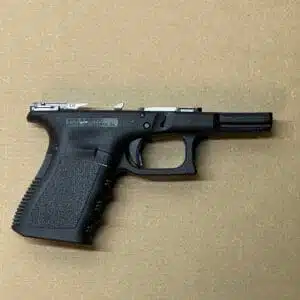 Glock 19 23 Gen 3 Oem Factory Lower Frame Factory Parts New Tcm Stock 3 Glock 19 Gen 3 lower frame and factory parts displayed on a neutral background.