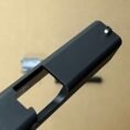 Glock 19 OEM complete slide assembly Gen 3 with matte black finish and precision cutout.
