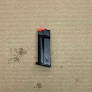 Smith & Wesson MP9 Shield Plus OEM 10-round magazine with red indicator and matte finish.