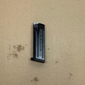 Smith & Wesson MP9 M20 OEM 15-round magazine on a neutral background.