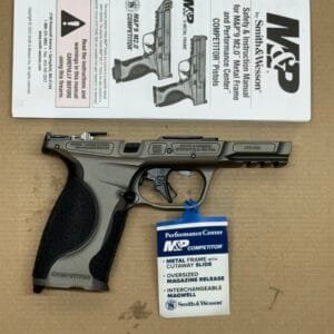 Smith & Wesson MP9 M20 full-size handgun with OEM metal lower frame and TCM stock.