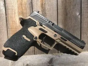 Sleek modern handgun with ergonomic design on rustic wooden background, showcasing Tcm stock features.