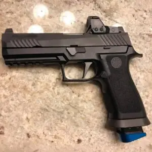 Sleek modern pistol with reflex sight, ergonomic grip, and tactical design for precision shooting.