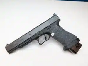 Sleek modern handgun with tactical rail and extended magazine for enhanced performance and efficiency.