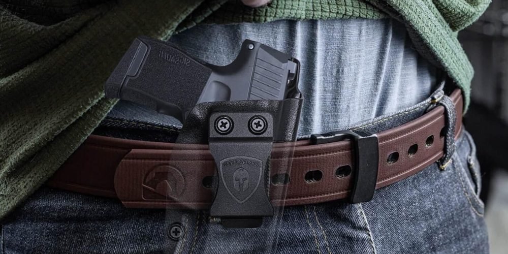 The Sig Sauer P365: The Compact Powerhouse for Everyday Carry Compact Sig Sauer P365 holstered for everyday carry, showcasing casual style and readiness.